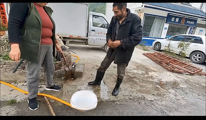 The first disabled slave in the video, forced to work next to the police station