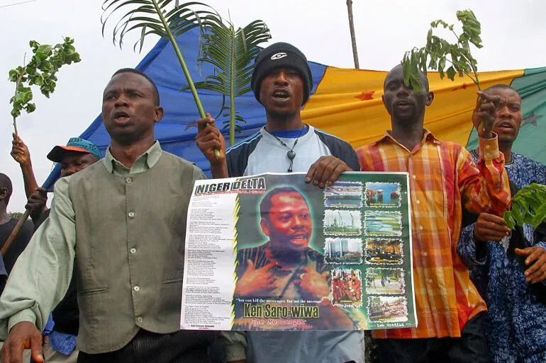 Protesters march in Hacot Port, commemorating the tenth anniversary of Saro-Wiwa’s execution (AP)