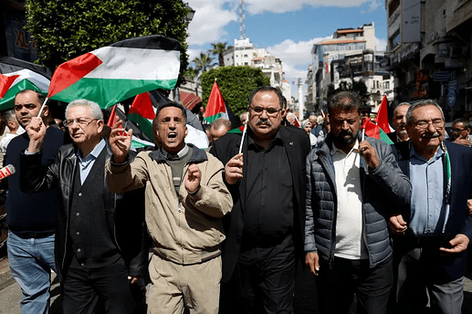 Palestinian crowds protesting Israeli invasion of Gaza on the West Bank