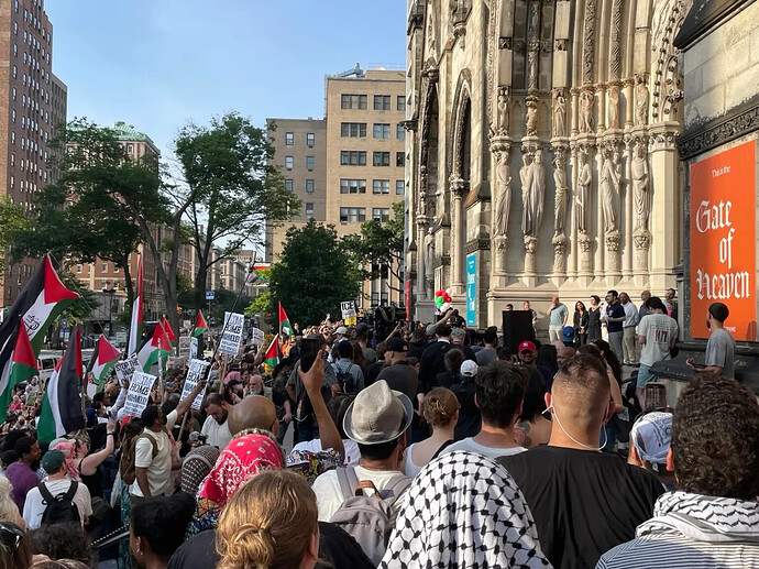 Khalil speaking at the Welcome Home rally on June 22 | 690x517
