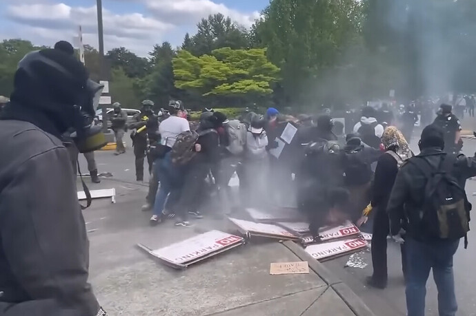 Protesters clash with police in Tukwila, Washington. Image source: Today is America video screenshot