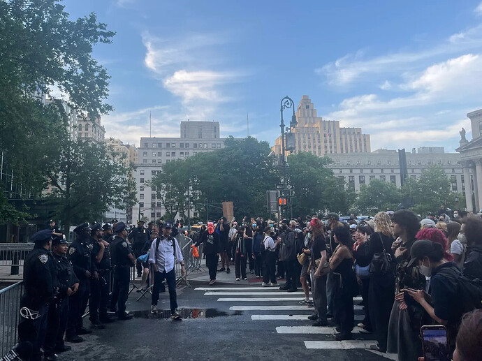 Tuesday evening, protesters surround the ICE building in Lower Manhattan, New York City