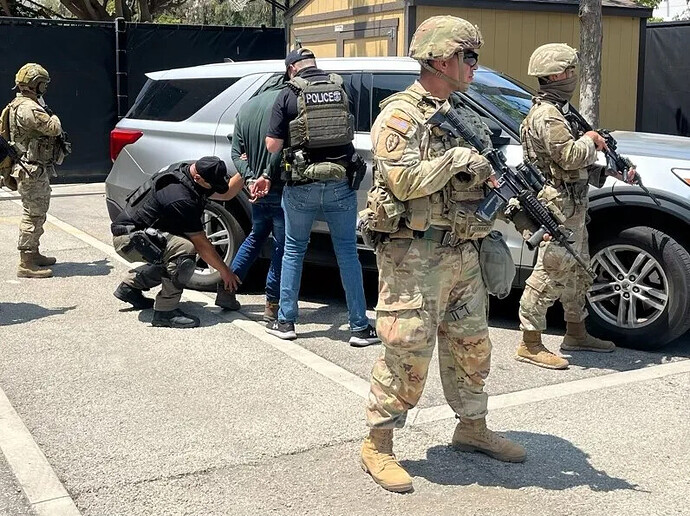 On June 10, 2025, U.S. troops escort ICE agents during a raid in Los Angeles. Image from ICEgov, via X platform