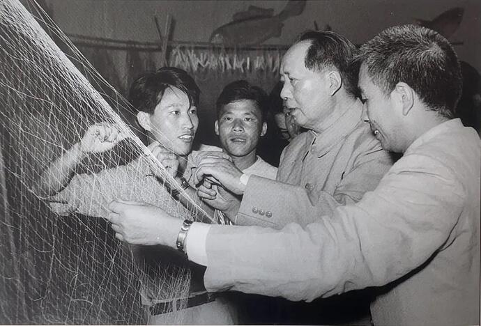 Chairman Mao visiting a new type of fishing gear exhibition