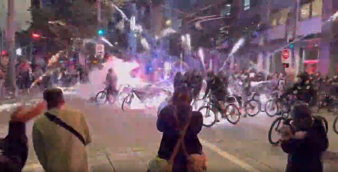 Fireworks exploding on Seattle police bikes