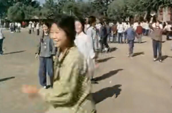 Scene of students happily playing during break in the documentary "Yu Gong Moves Mountains"'s "Ball Story" segment